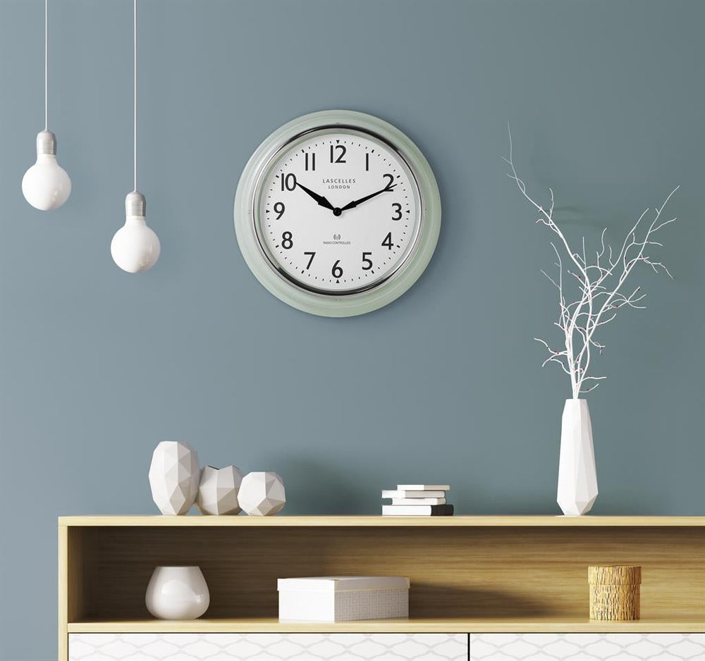 Royale Laminate Handmade Radio Grill Wall Clock in Sage Green from Royale outlet - Midcentury French Atomic Retro style